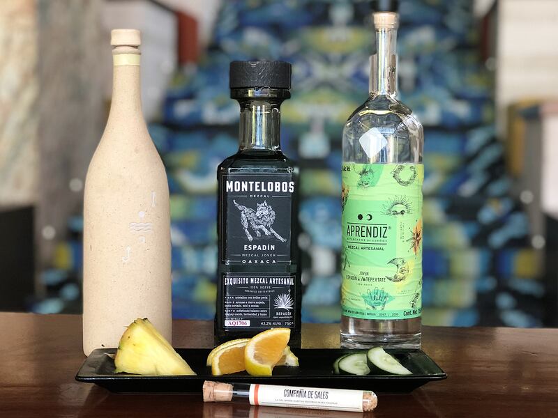 Tequila bottles and garnishes