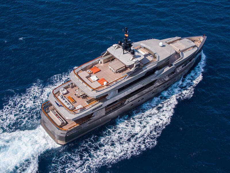 Yacht from the air showing several decks to relax on
