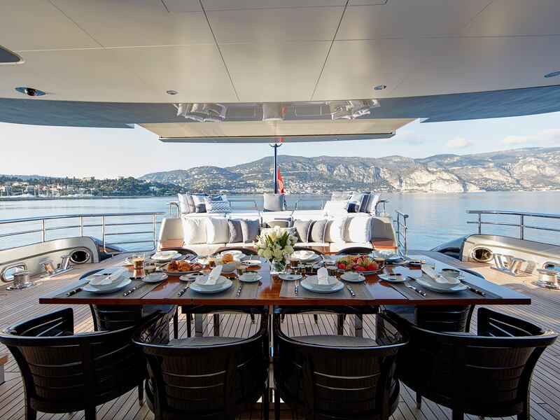 Dining area on deck with seaviews