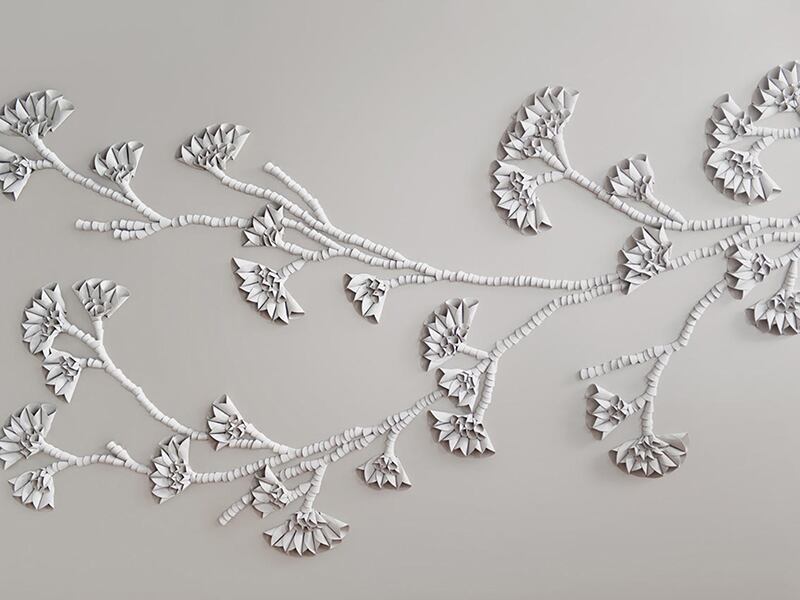 A fabric wall hanging with beautifully embroidered flowers