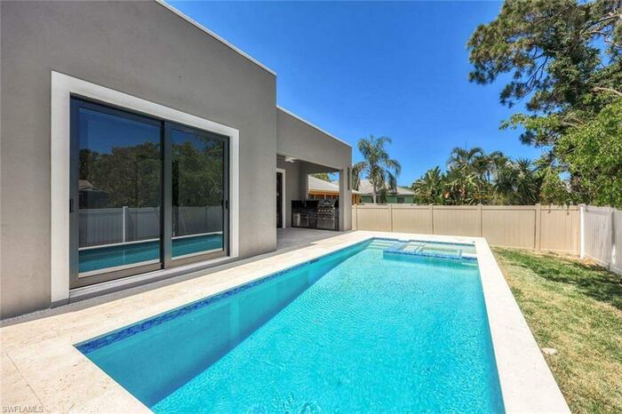 Property located at Single Family Home/House in Naples, FL