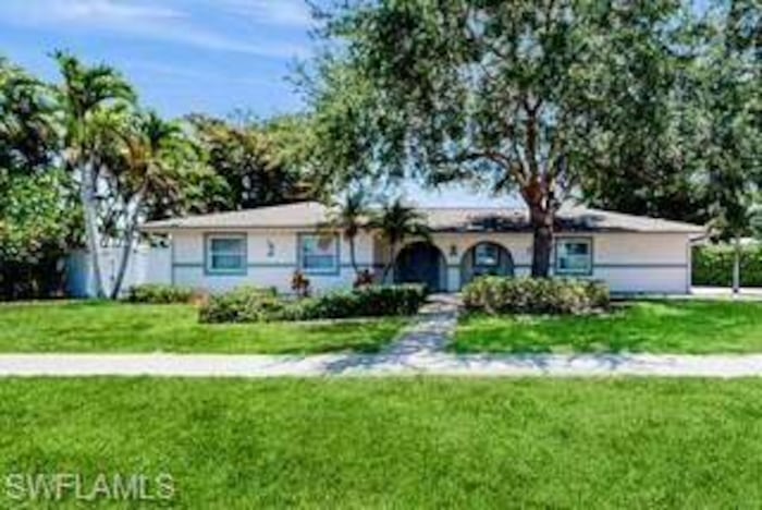 Property located at Single Family Home/House in Naples, FL