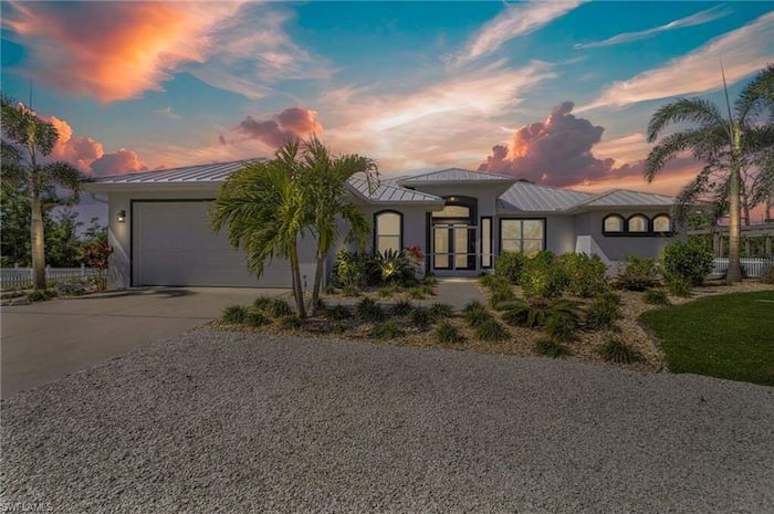 Property located at Single Family Home/House in Bokeelia, FL