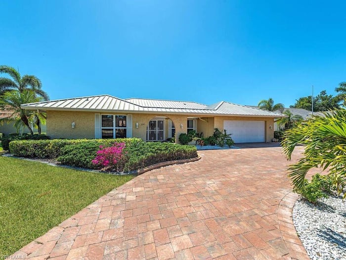 Property located at Single Family Home/House in Naples, FL