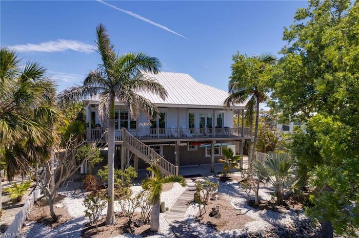 Property located at Single Family Home/House in Bokeelia, FL